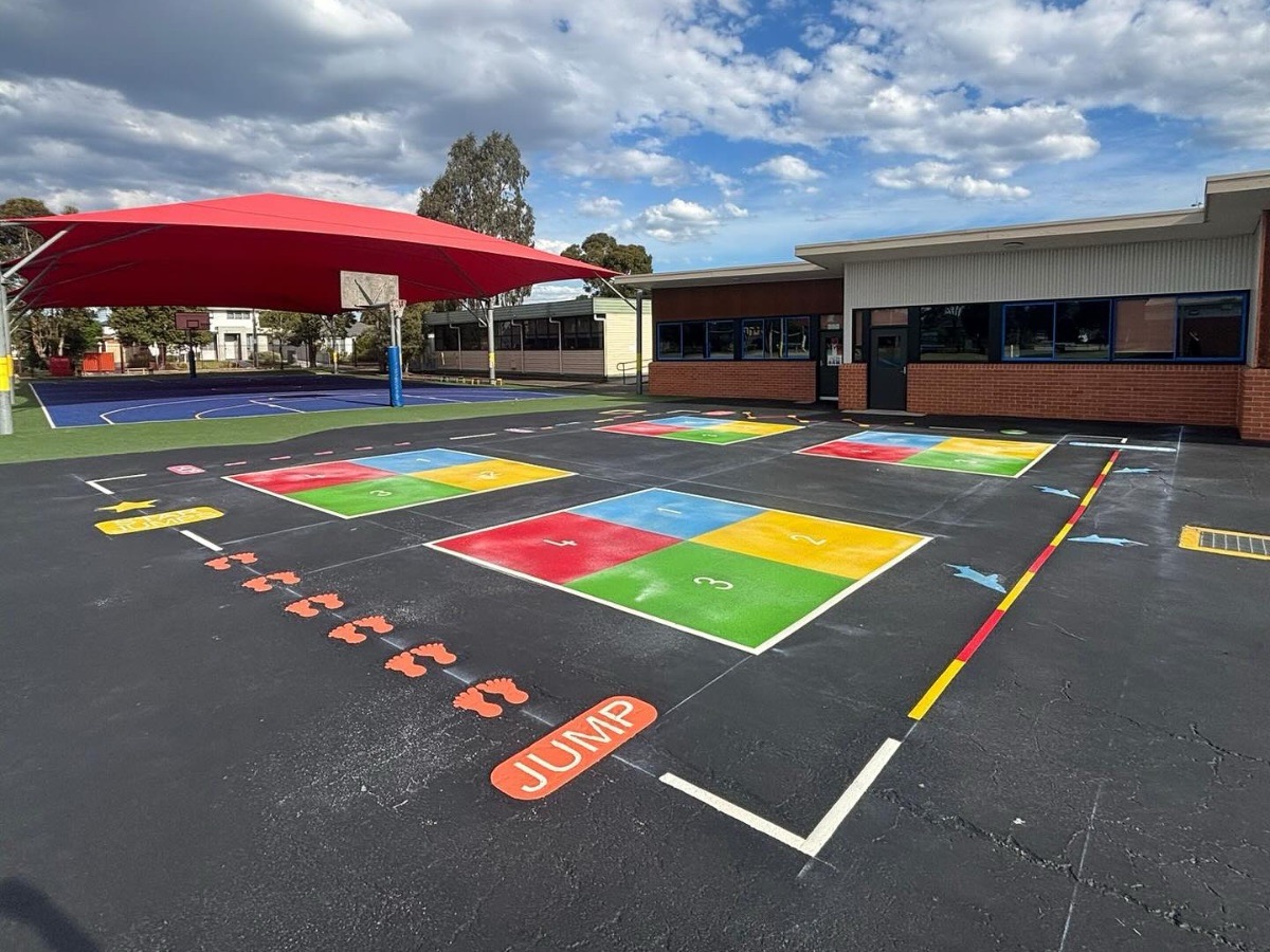 Thermoplastic playground designs on an Australian school playground surface